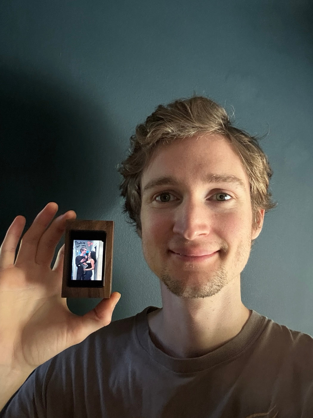 The founder of Linko holding a Linko